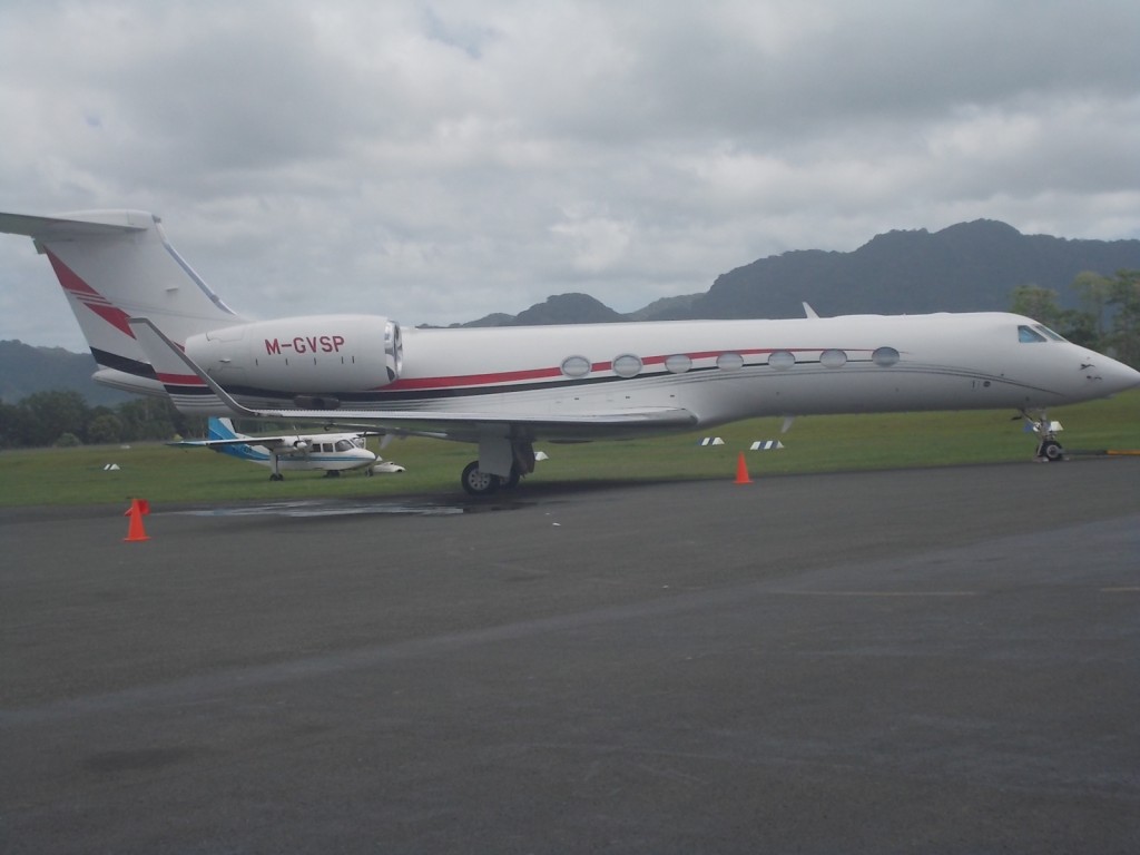 An airplane sitting on the runway